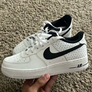 White and Black Nike forces